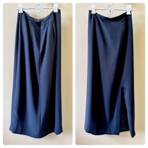 Black pencil skirt fully lined with slit